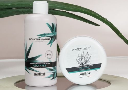 Actualit&eacute;s de la marque Sublimo, cosm&eacute;tiques capillaires naturels et fran&ccedil;ais. Photographie du shampooing et du masque Aloe Vera pour cheveux boucl&eacute;s